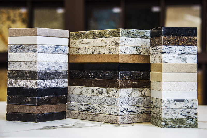 Three stacks of solid surface and quartz surfaces